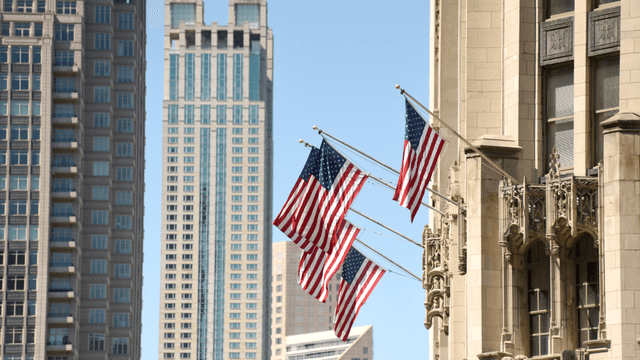 American flag on building in downtown